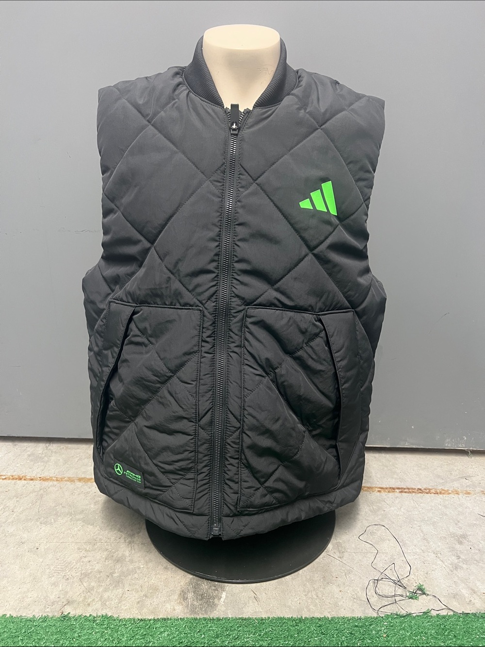 Adidas X Mercedes AMG F1 Collab 
Black Quilted Vest with Green Logo